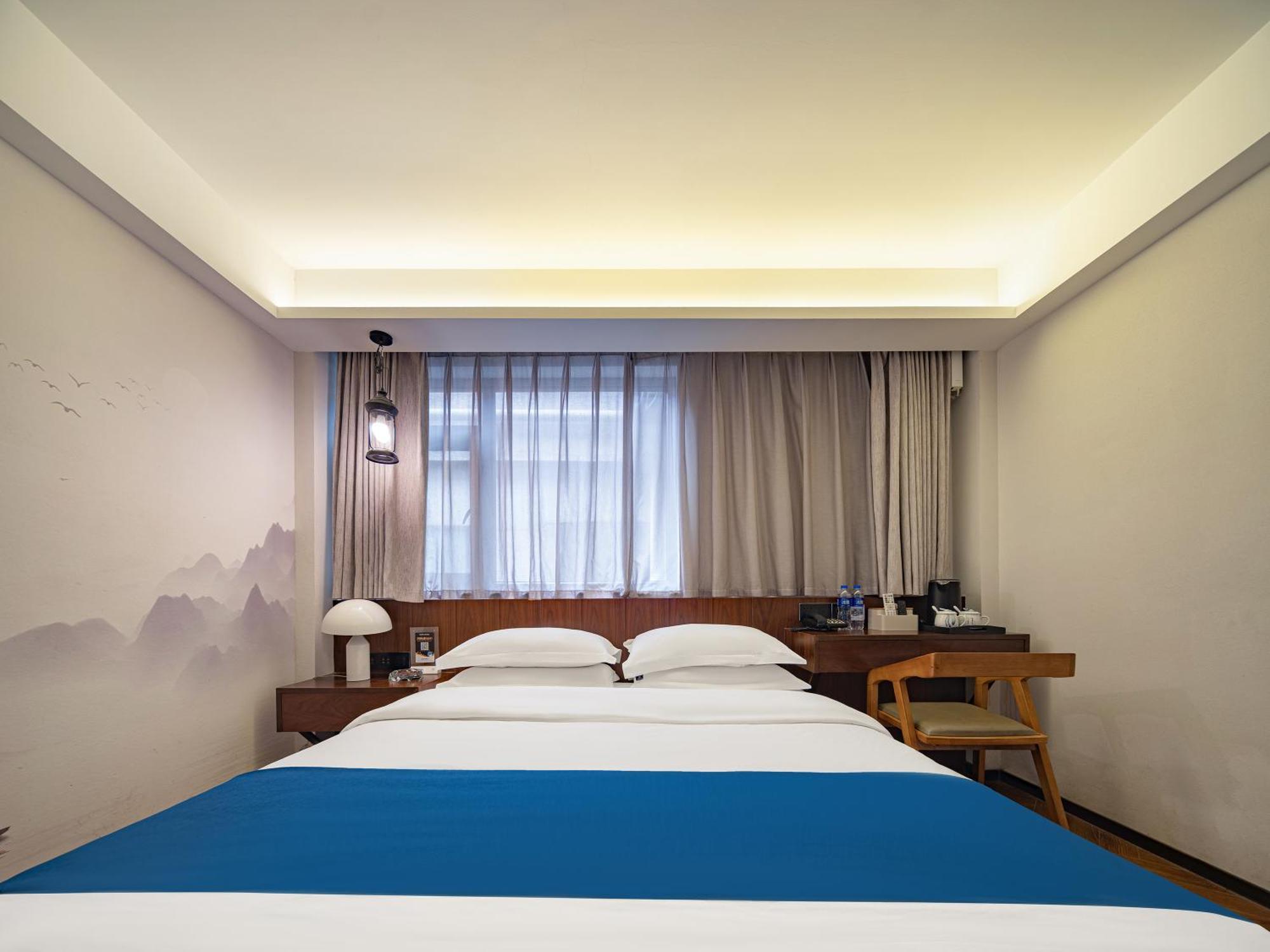 Hotel 張家界武陵源北岸輕奢客棧 森林公園店 Čang-ťia-ťie Exteriér fotografie