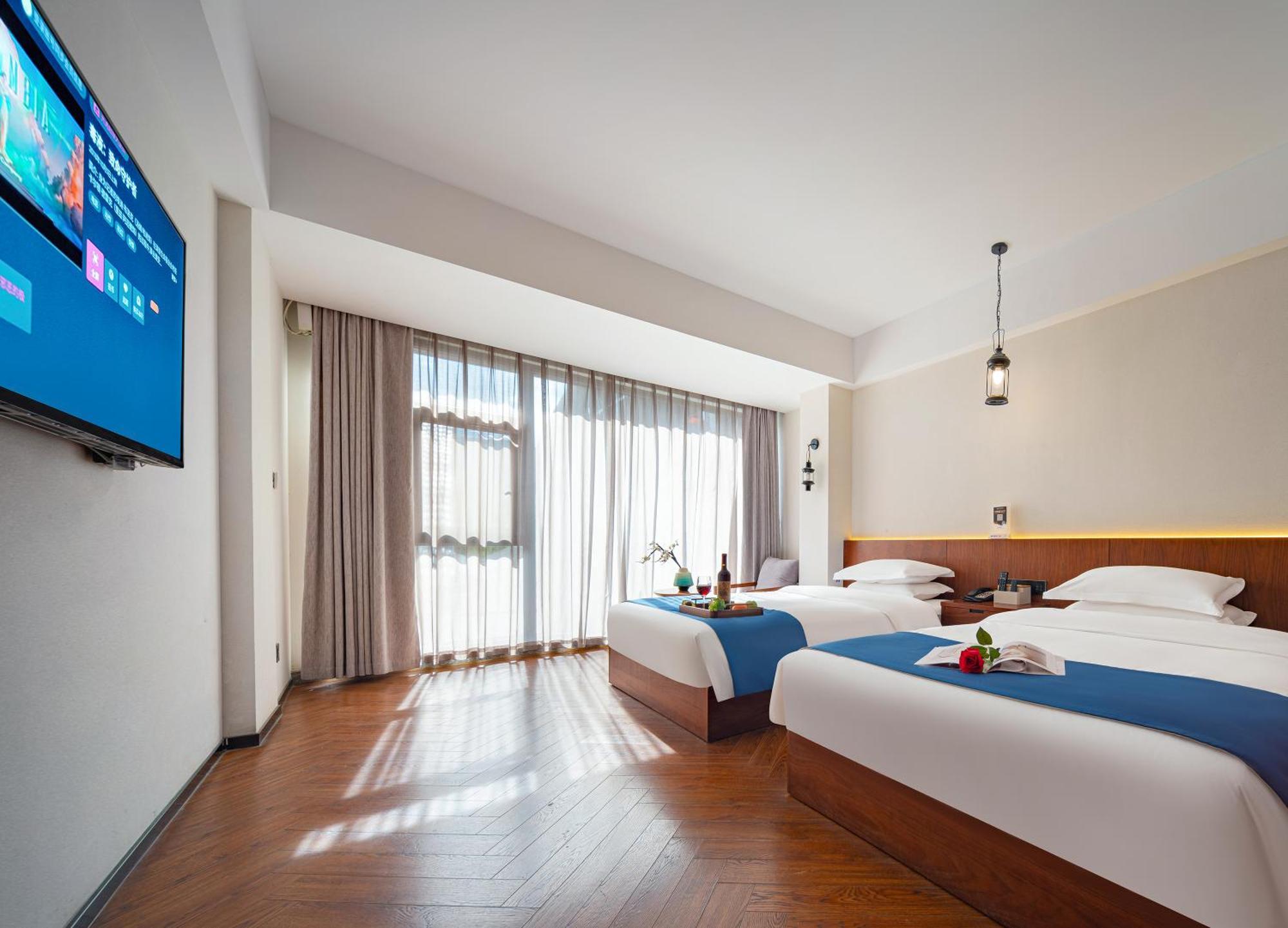 Hotel 張家界武陵源北岸輕奢客棧 森林公園店 Čang-ťia-ťie Exteriér fotografie