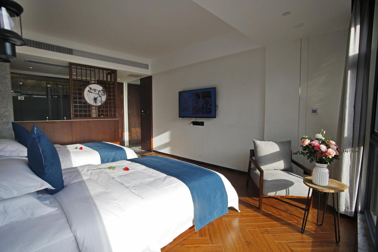 Hotel 張家界武陵源北岸輕奢客棧 森林公園店 Čang-ťia-ťie Exteriér fotografie