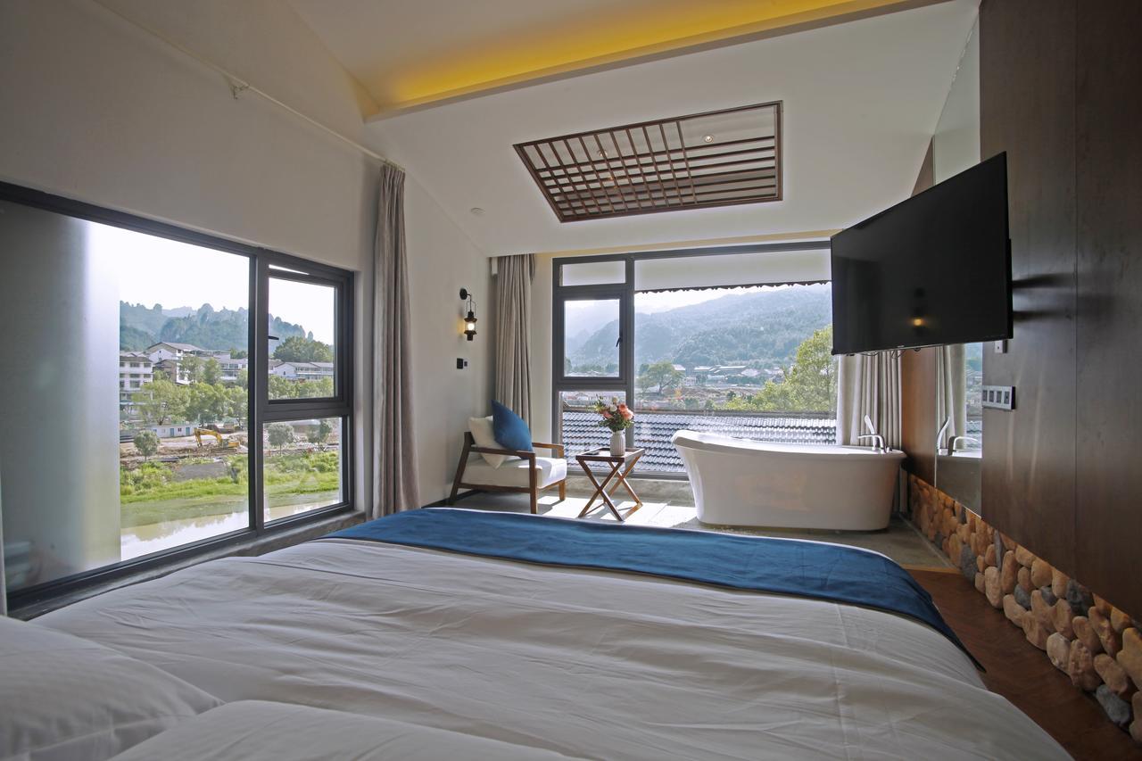 Hotel 張家界武陵源北岸輕奢客棧 森林公園店 Čang-ťia-ťie Exteriér fotografie